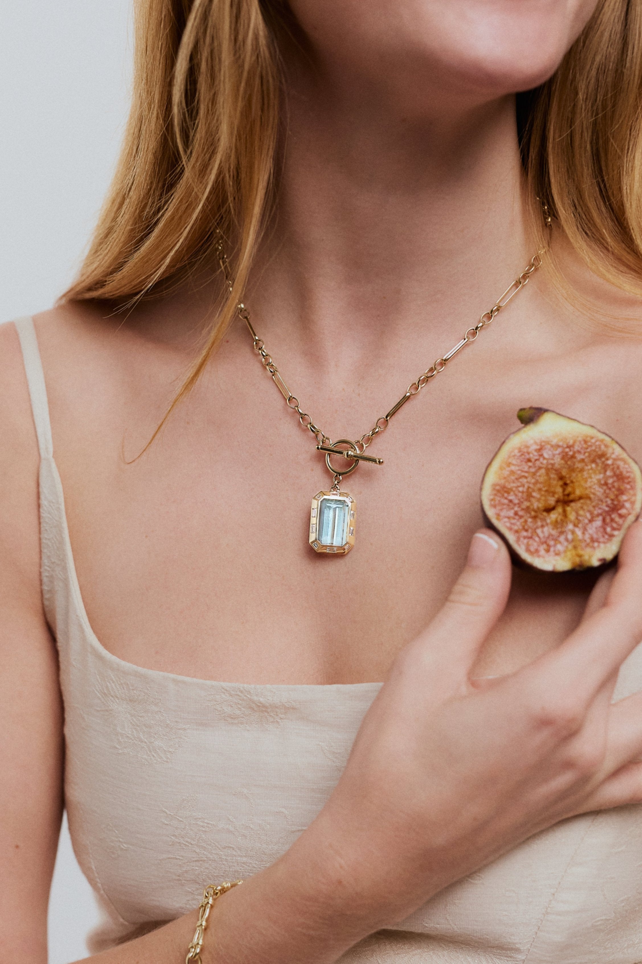 Aquamarine. Aquamarine necklace. Blue gemstone necklace. Big gemstone necklace. Diamond necklace. Blue gemstone and diamond necklace. Gemstone necklace. T-bar necklace. Gold necklace.