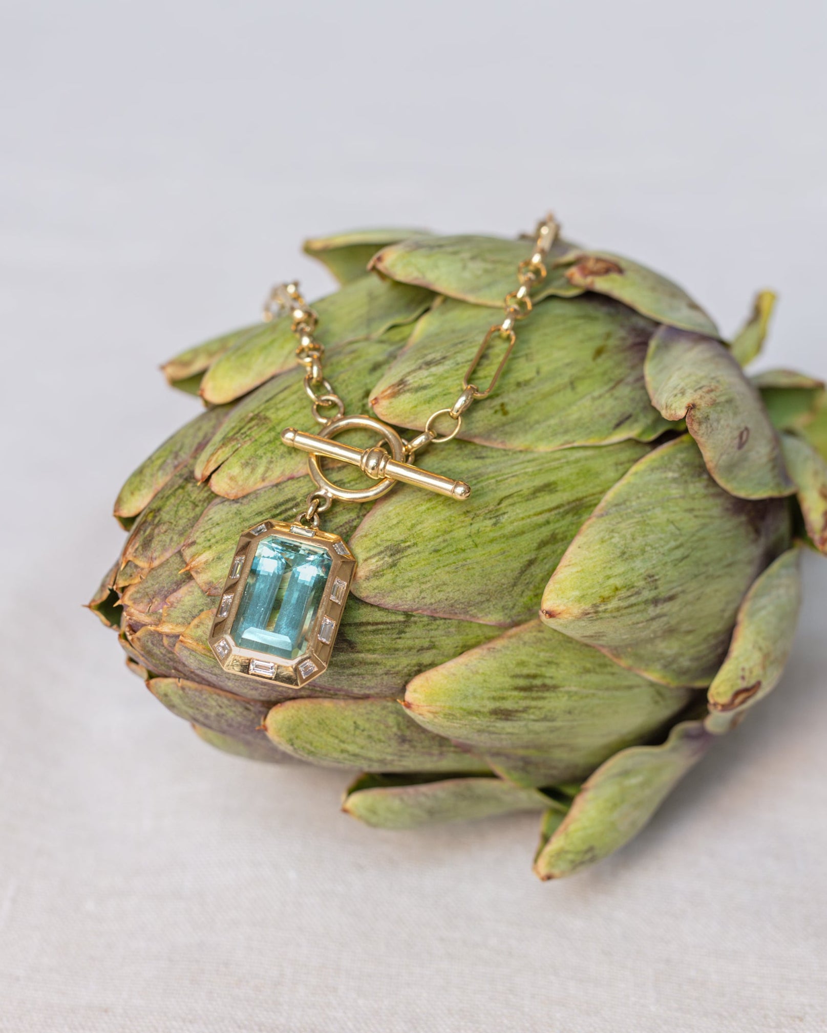 Aquamarine. Aquamarine necklace. Blue gemstone necklace. Big gemstone necklace. Diamond necklace. Blue gemstone and diamond necklace. Gemstone necklace. T-bar necklace. Gold necklace.