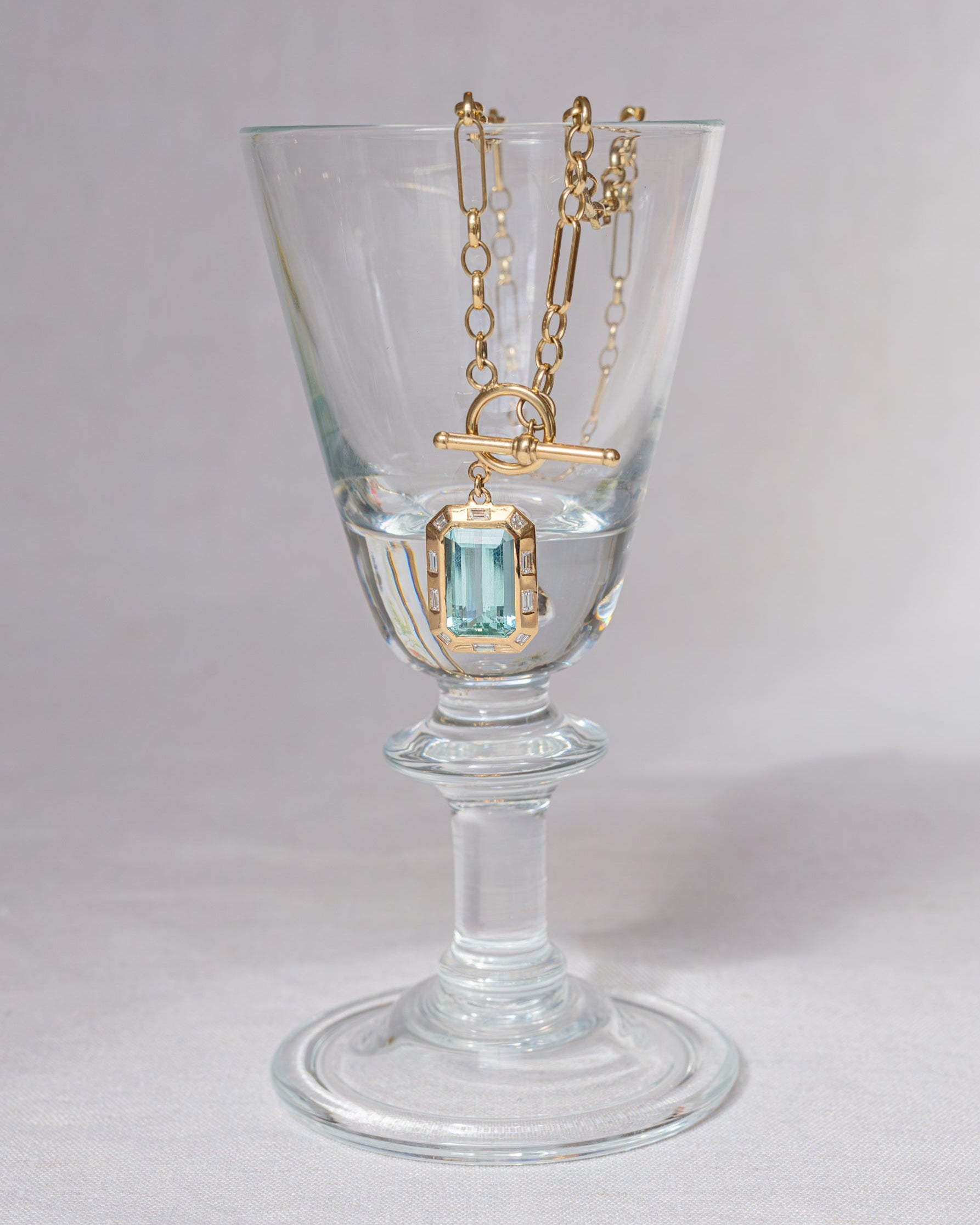 Aquamarine. Aquamarine necklace. Blue gemstone necklace. Big gemstone necklace. Diamond necklace. Blue gemstone and diamond necklace. Gemstone necklace. T-bar necklace. Gold necklace.