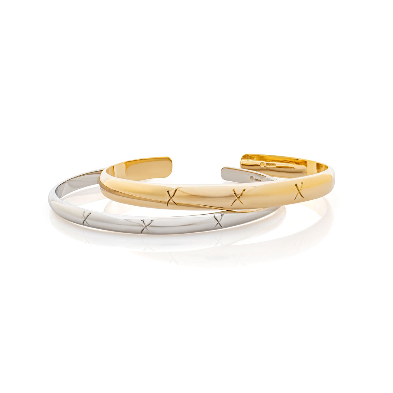 Binding bangle. Gold bangle. Silver bangle. Engraved bangle.