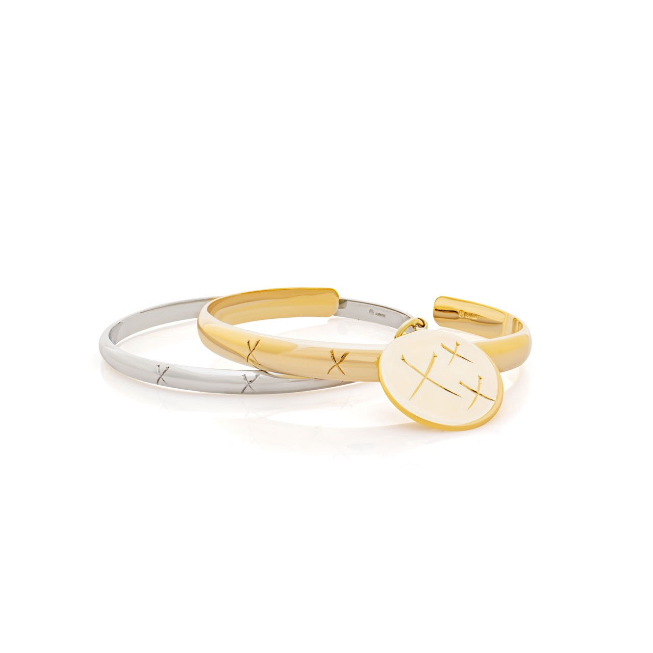 Binding bangles. Gold bangle. Silver bangle. Engraved bangle. Binding Token. Gold disc pendant. Gold pendant.