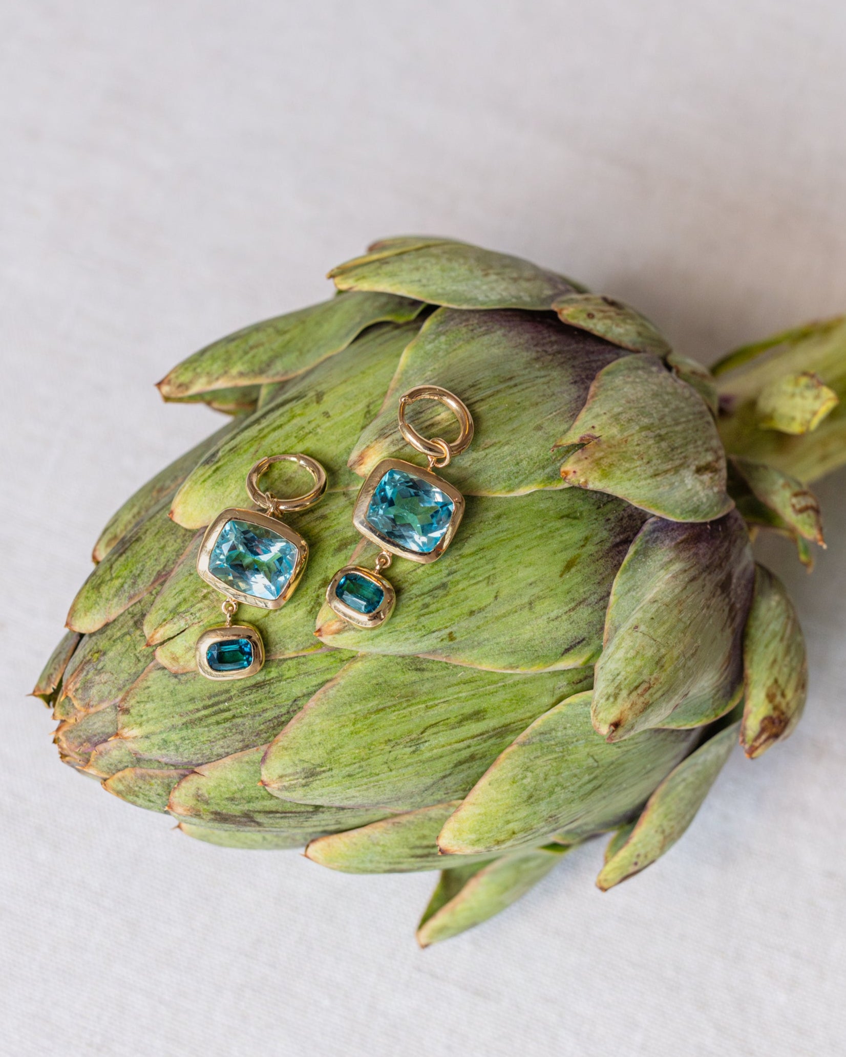 Blue Topaz and Tourmaline earrings. Blue gemstone earrings. Big earrings. Statement earrings. Cocktail earrings. French 75 cocktail earrings. Cocktail jewellery. Double drop earrings.