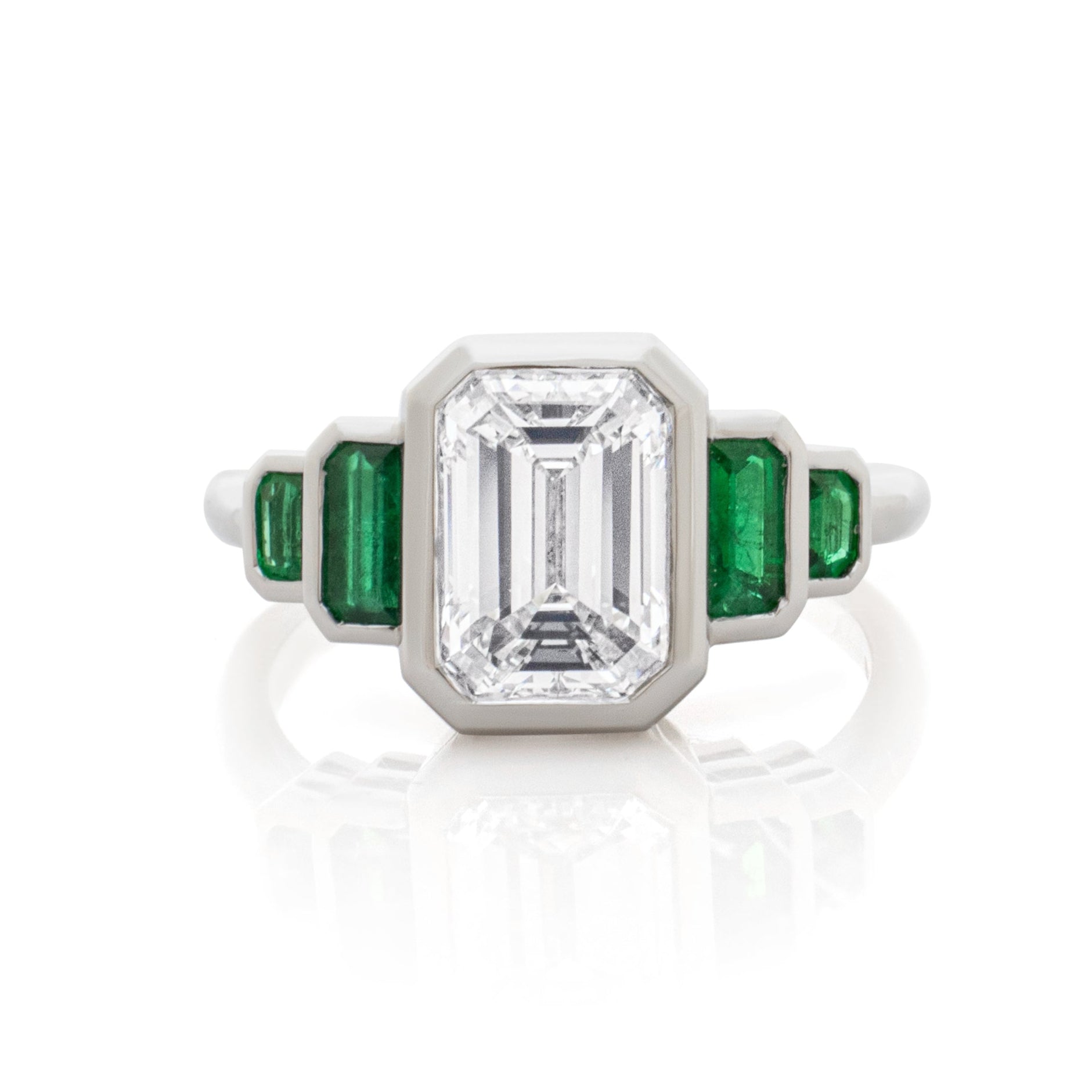 Diamond and emerald engagement ring. Five stone engagement ring. 5 stone ring. Emerald cut Diamond. Art-deco engagement ring. Platinum engagement ring.