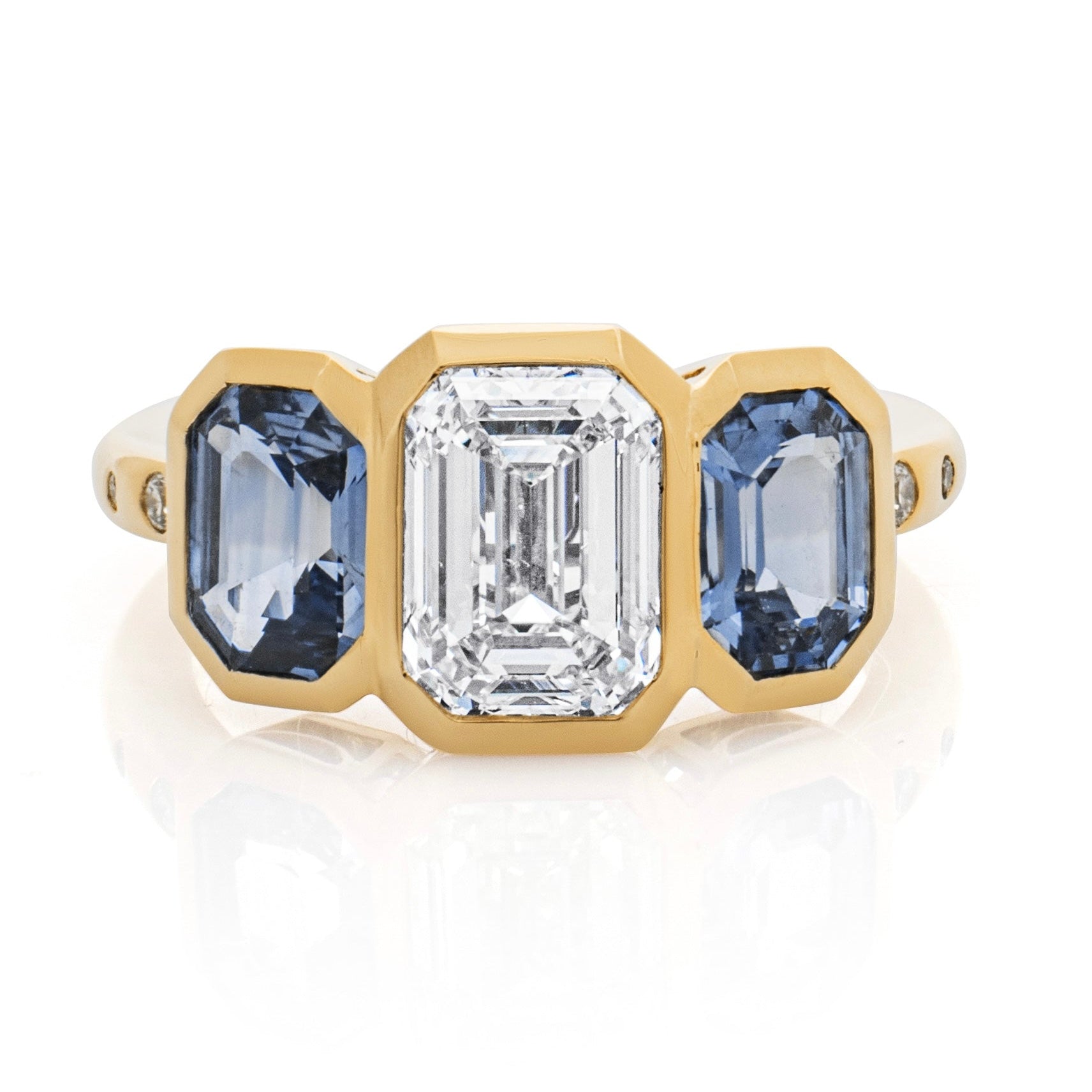 Diamond and Sapphire engagement ring.  Three-stone Engagement Ring