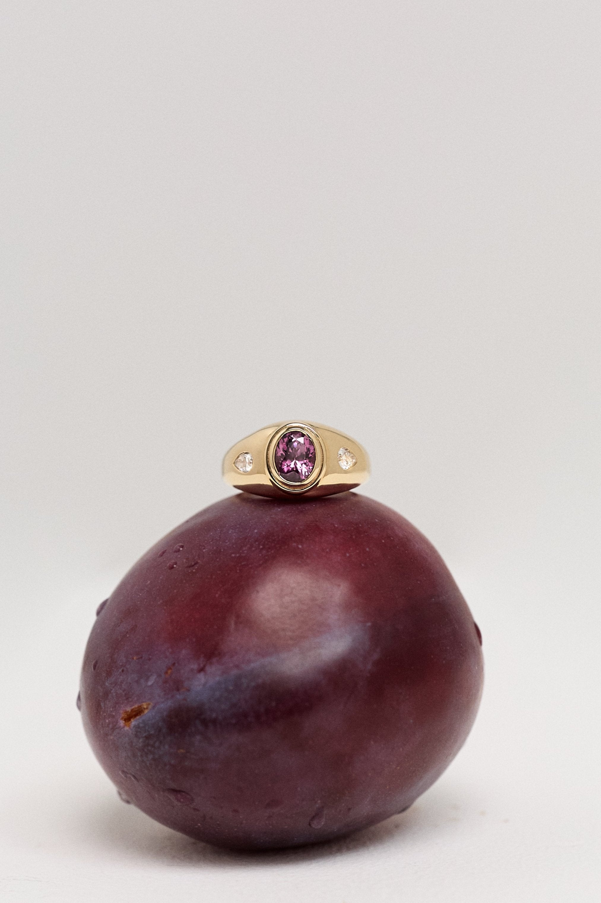 Rhodolite Garnet and Diamond ring. Diamond ring. Coloured Stone Ring. Bombé ring. Signet style ring. Gold ring. Chunky gold ring. Solid gold ring. Cocktail ring.
