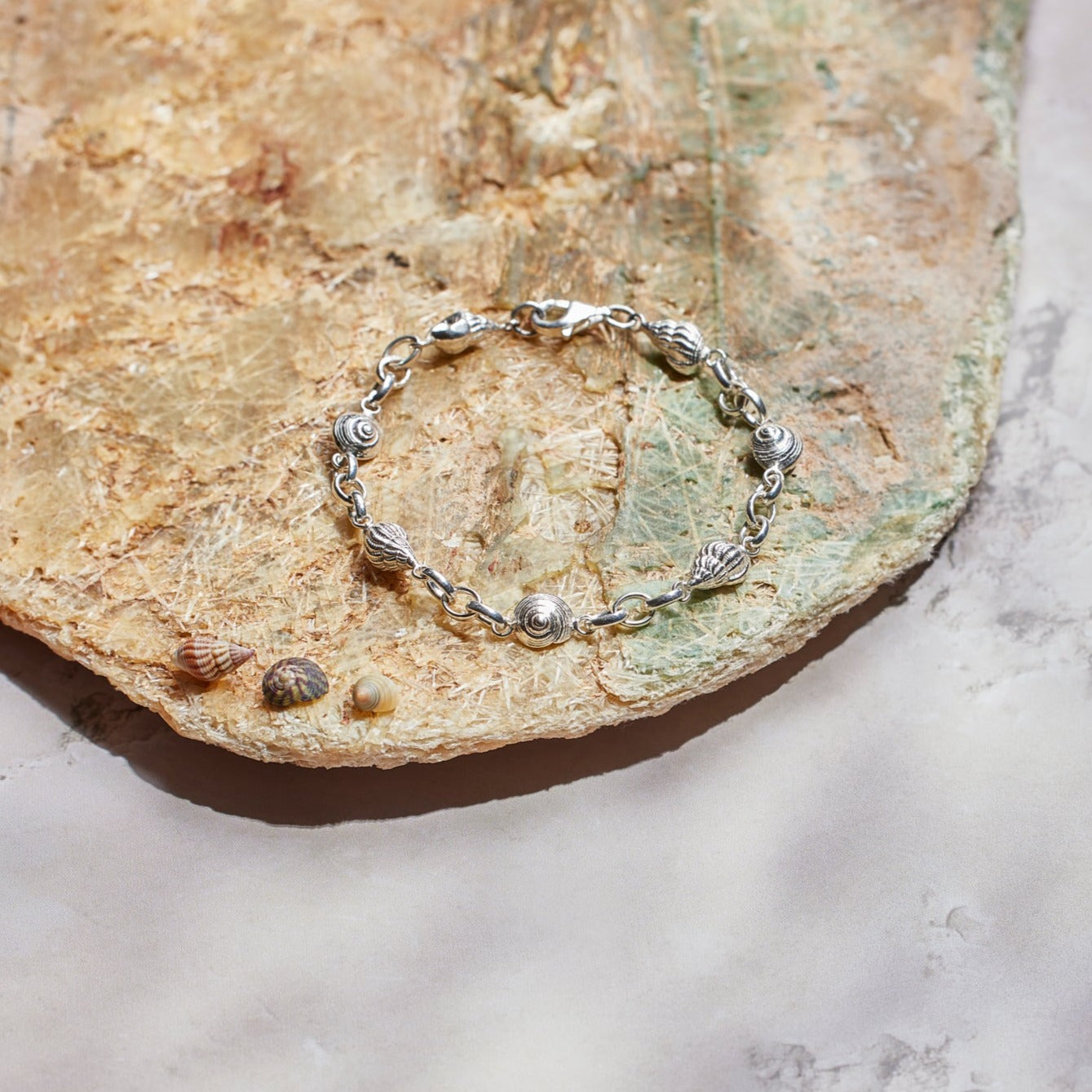 Port Isaac bracelet. Port Isaac, Cornwall. Cornwall jewellery. Cornish jewellery. Shell bracelet. Silver shell bracelet. Cornish shell jewellery. Silver shell jewellery. Gold shell jewellery. Those Happy Places. Serena Ansell Jewellery.