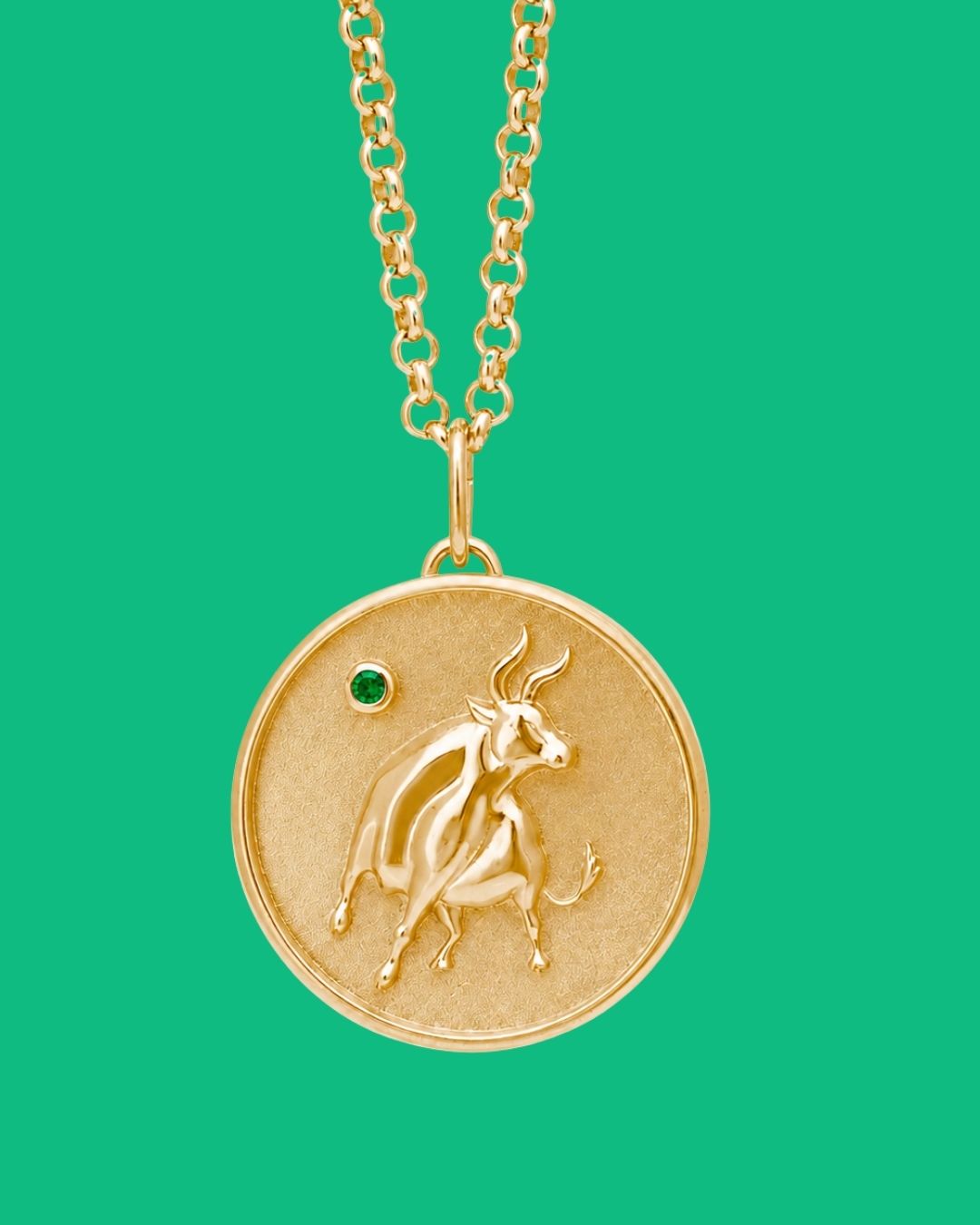Taurus Zodiac pendant. Taurus Zodiac necklace. Birthstone pendant. Birthstone jewellery. Medallion. Gold zodiac pendant. Solid gold and Emerald pendant. Disc pendant. Gold disc pendant.