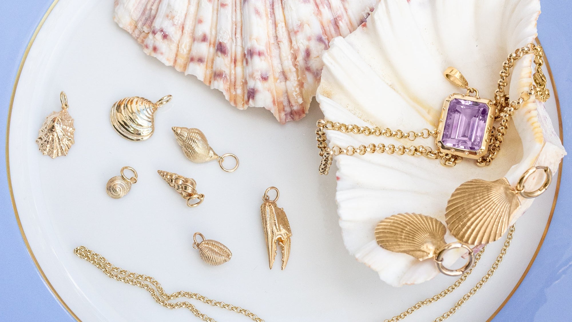 Solid gold shell jewellery. Shell penbdants. Shell earrings