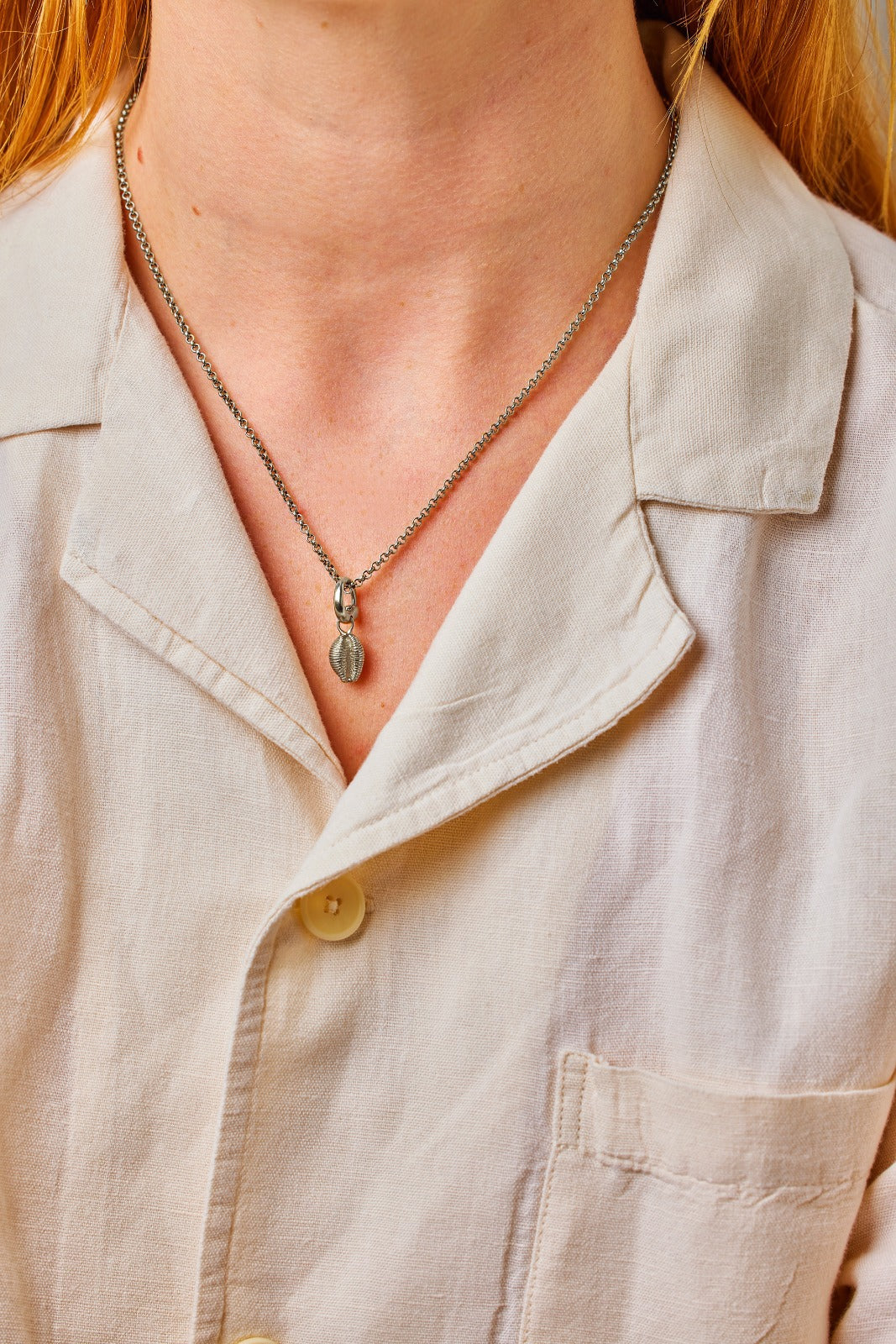 Langland pendant. Cowrie shell pendant. Langland charm. Langland necklace. Langland Bay, Wales. Wales jewellery. Gower jewellery. Wales shell jewellery. Silver shell jewellery. Gold shell jewellery. Those Happy Places. Cowrie shell necklace.