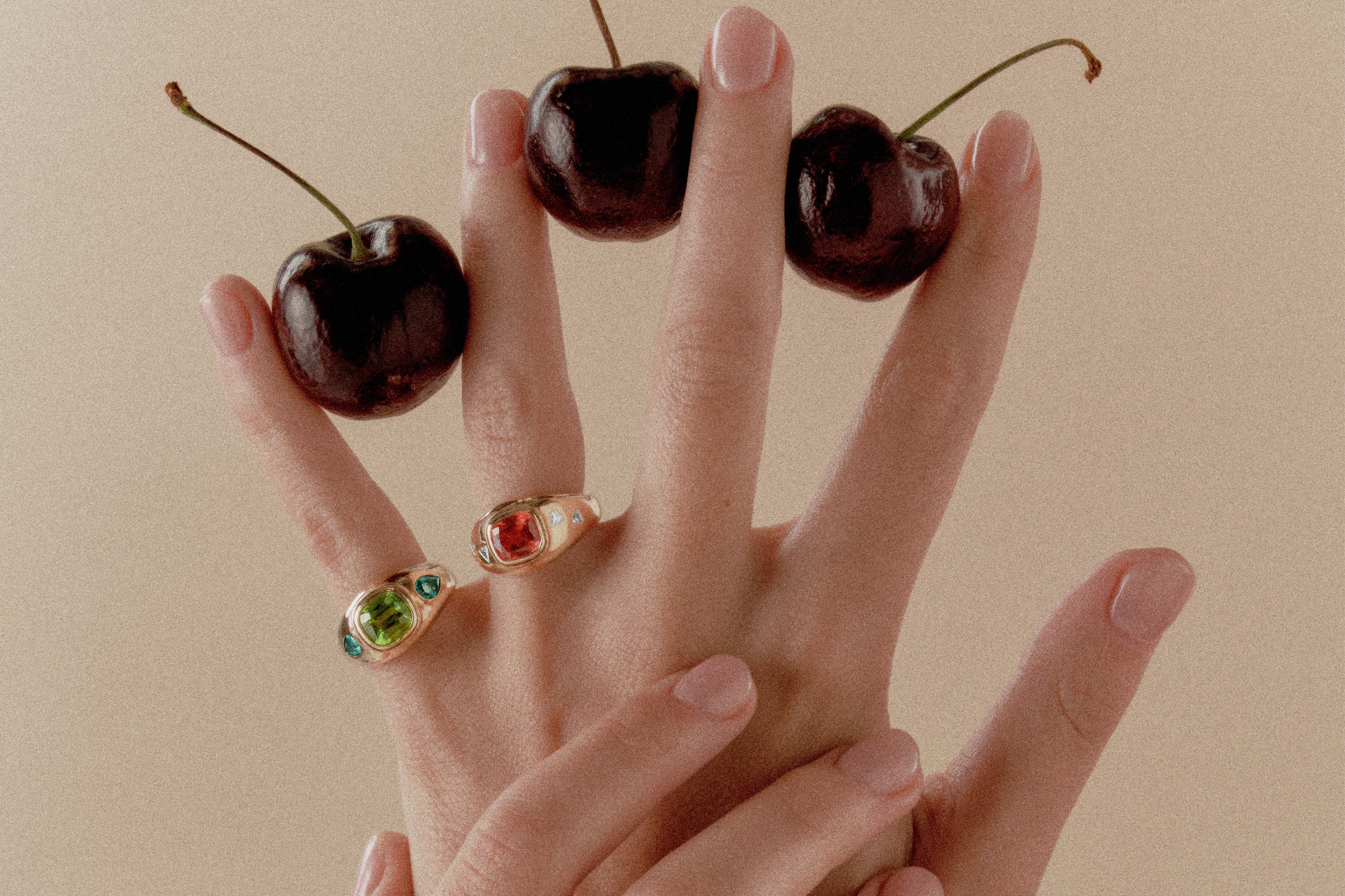 Solid gold and gemstone rings by Serena Ansell