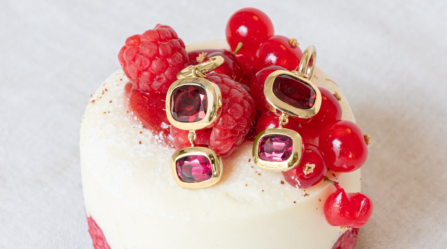 Solid gold and gemstone earrings by Serena Ansell