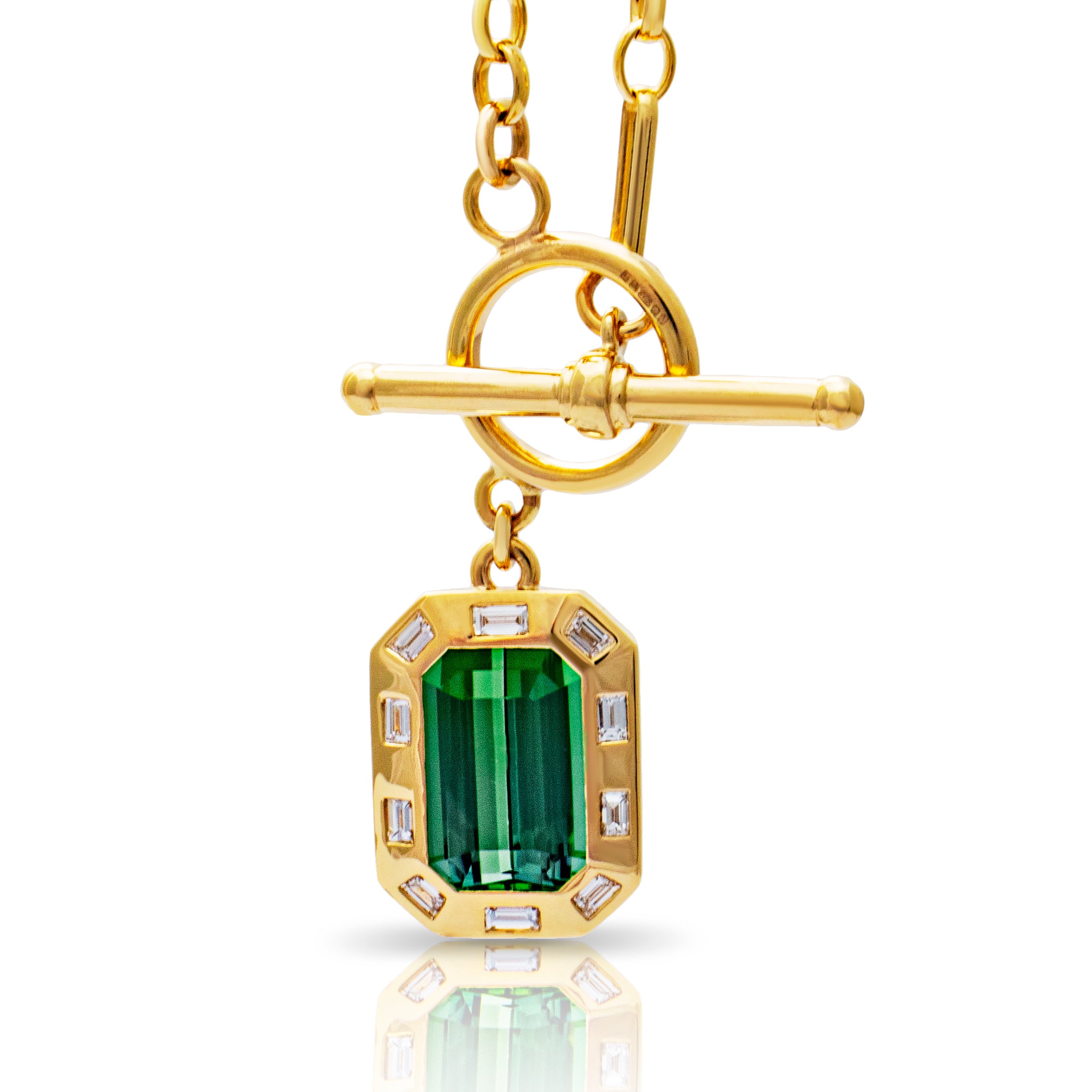 Green tourmaline t-bar necklace. Signature t-bar necklace. Green tourmaline necklace. Green gemstone necklace. Green tourmaline and diamonds. Green gemstone pendant necklace. Serena Ansell T-bar necklace. Solid gold necklace. Fine jewellery London. Serena Ansell Jewellery. 