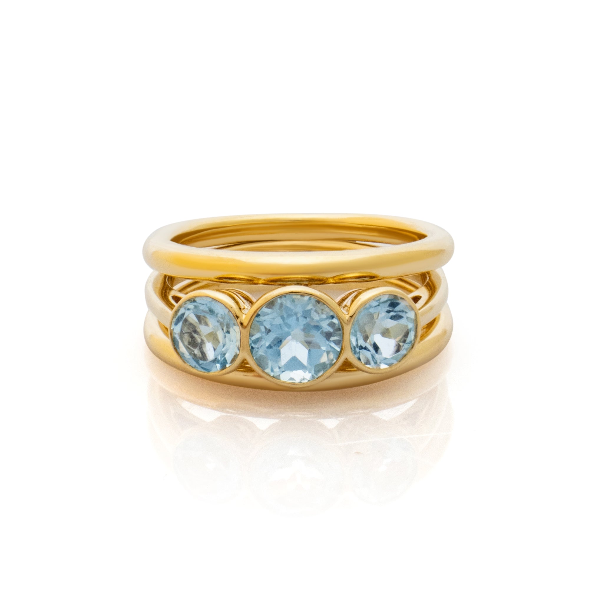 Three band three stone ring. Blue topaz ring. Serena Ansell Bespoke Jewellery. Bespoke Jewellery Designer London. 