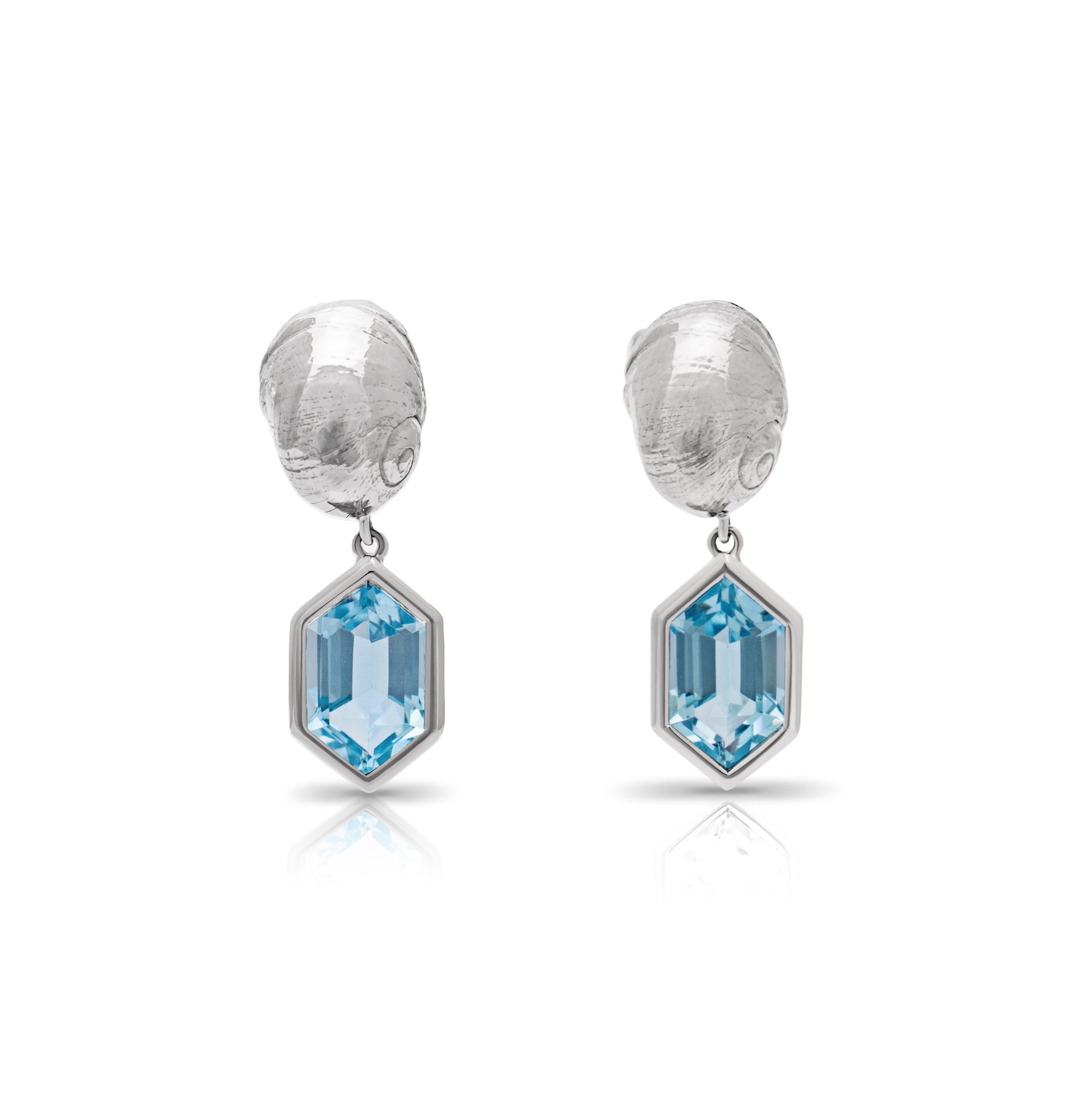 Bespoke 'Those Happy Places' collection Constantine Bay Shell Earrings in Platinum with a Hexagonal Topaz Drop. Serena Ansell bespoke jewellery design. Bespoke jewellery designer London. Bespoke earrings London. 