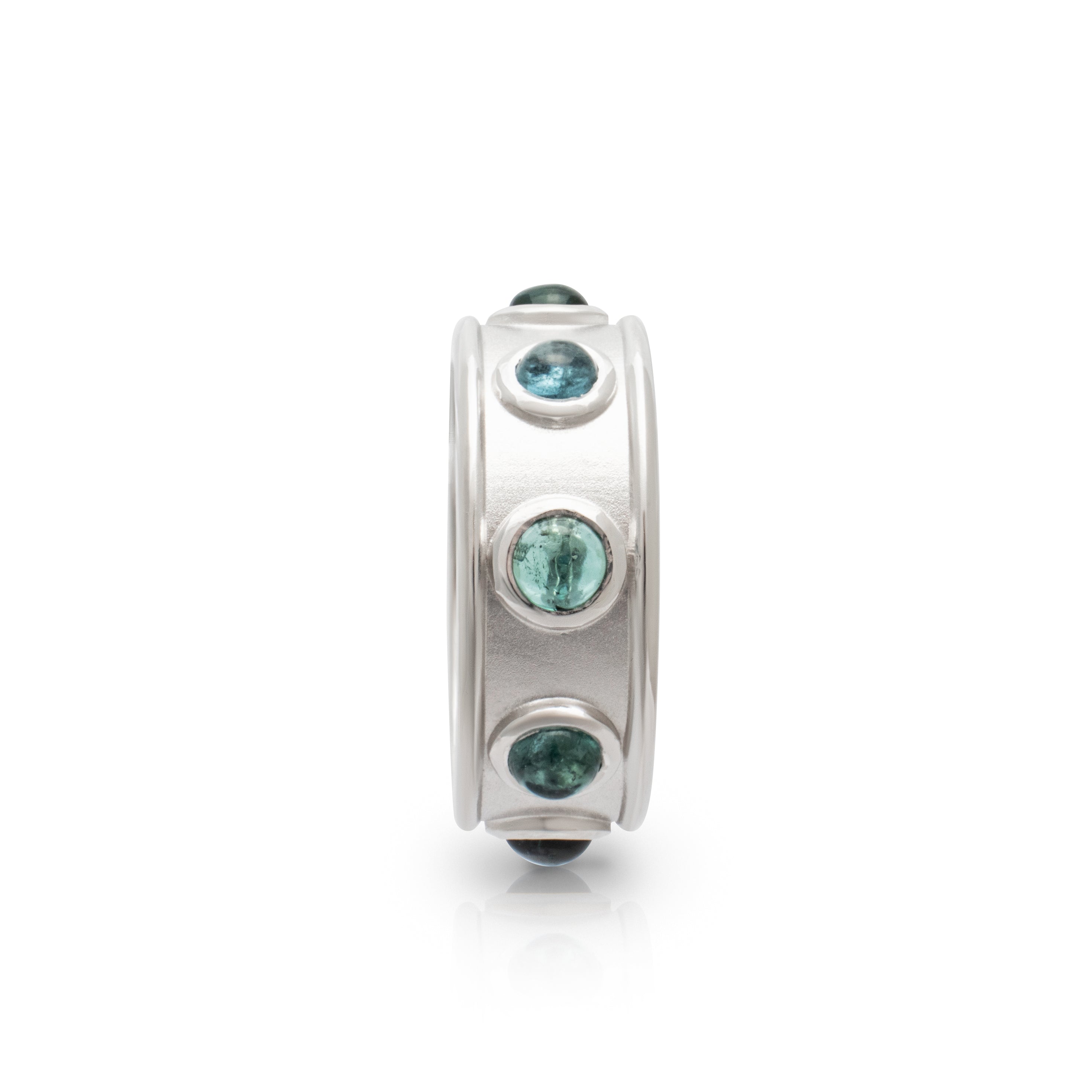 White gold and blue tourmaline cabochon ring. Serena Ansell Bespoke Jewellery. Bespoke Jewellery Designer London. 