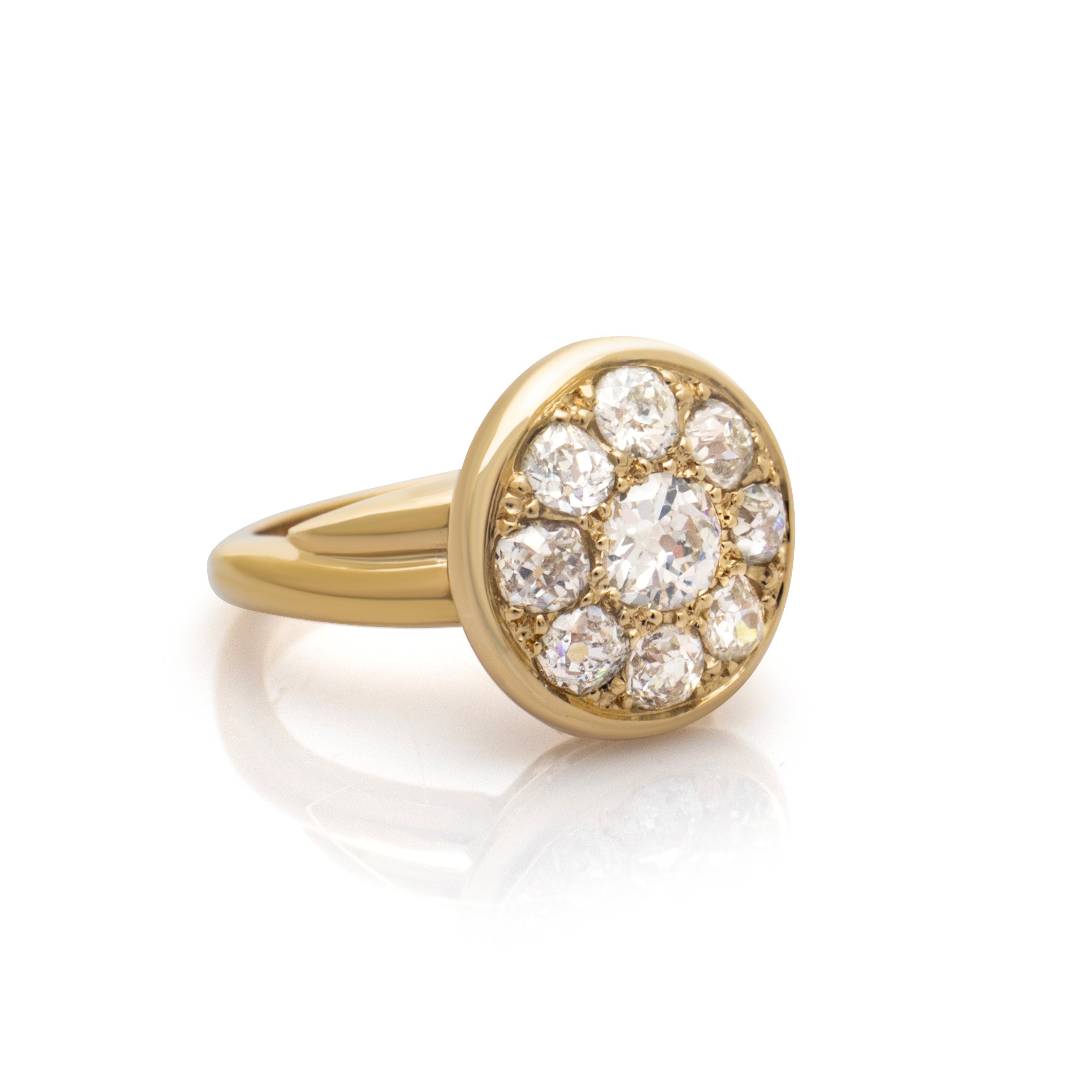 Modern cluster ring. Gold diamond cluster ring. Heirloom diamonds. Heirloom jewellery redesign. Serena Ansell Bespoke jewellery design. Old jewellery redesign. Bespoke jeweller London. 
