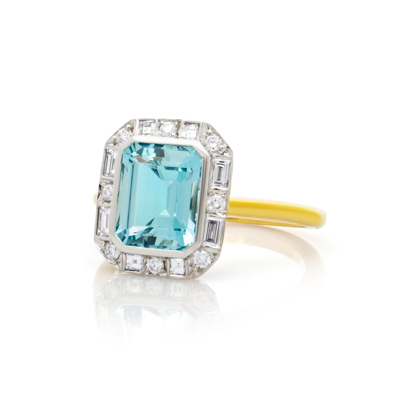 Aquamarine with a round & baguette Diamond surround