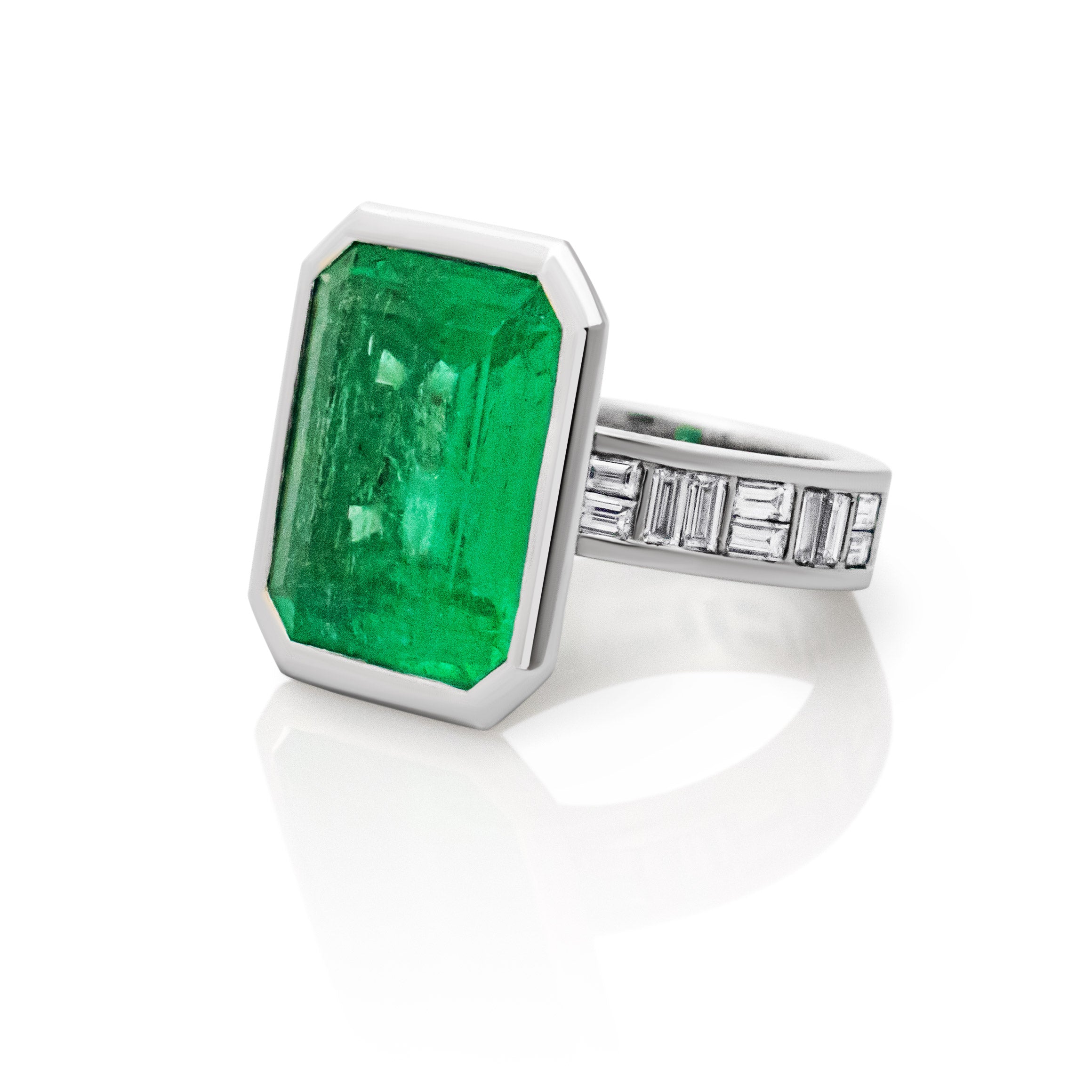 Colombian emerald and baguette diamond ring. Serena Ansell Bespoke Jewellery. Bespoke Jewellery Designer London. 