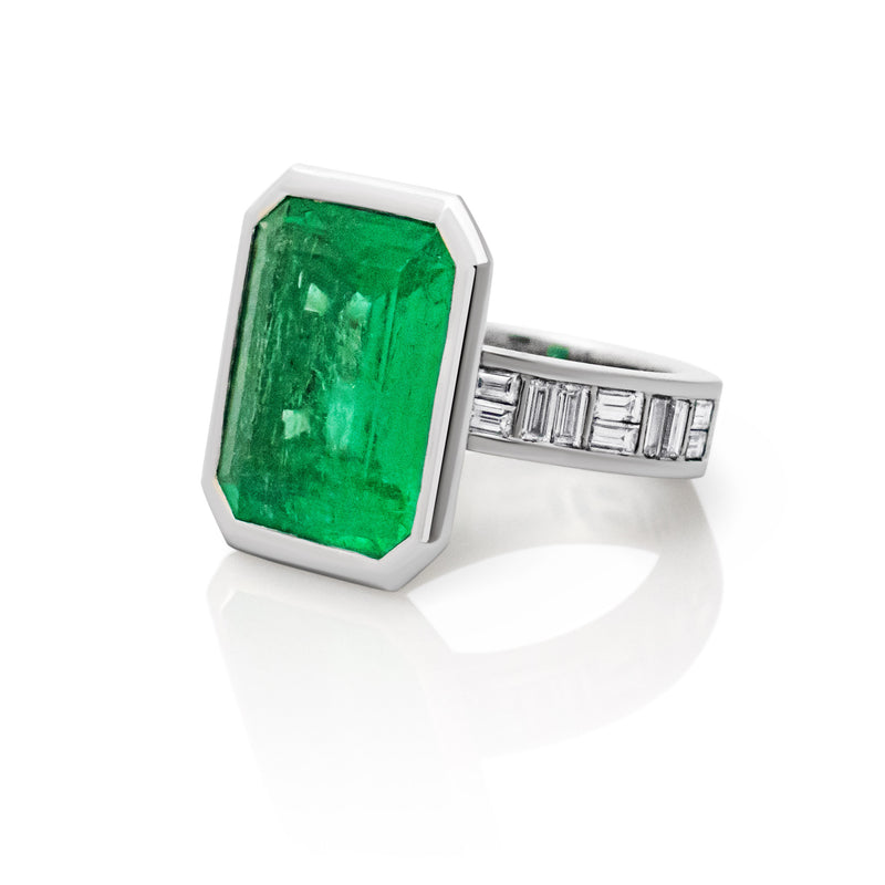 A 10.25 carat Colombian Emerald and Baguette Diamond Ring