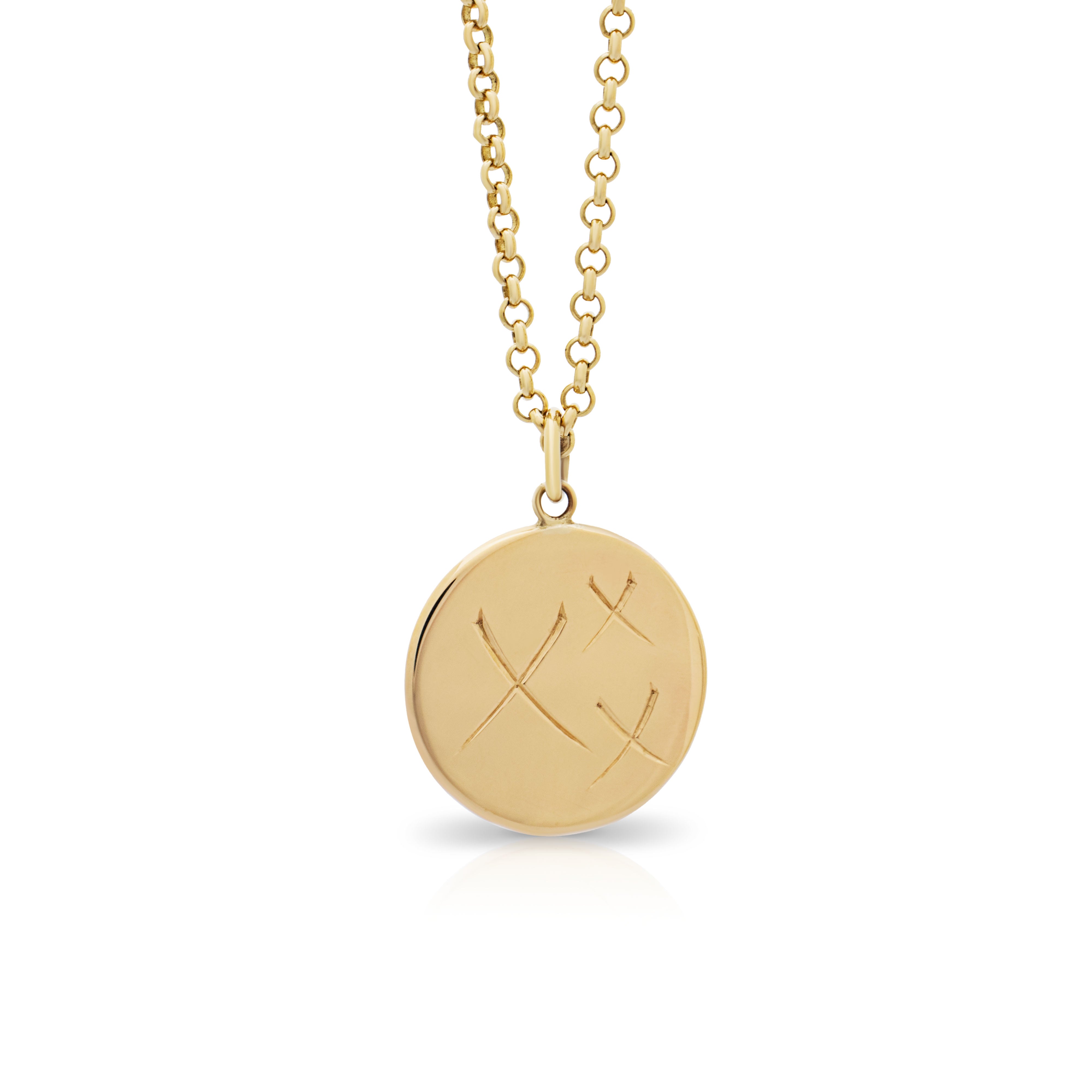 Gold disc pendant. Gold pendant.