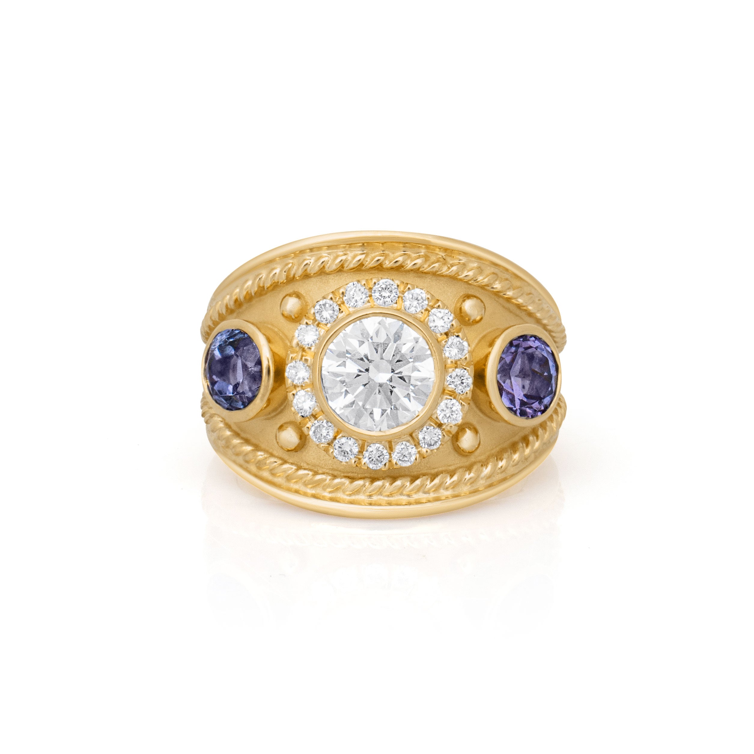 Diamond and Tanzanite Classical style ring. Elizabeth Gage. Chunky gold ring