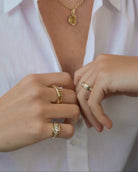 Diamond pinky ring. Five-stone diamond ring. Chunky pinky ring. 