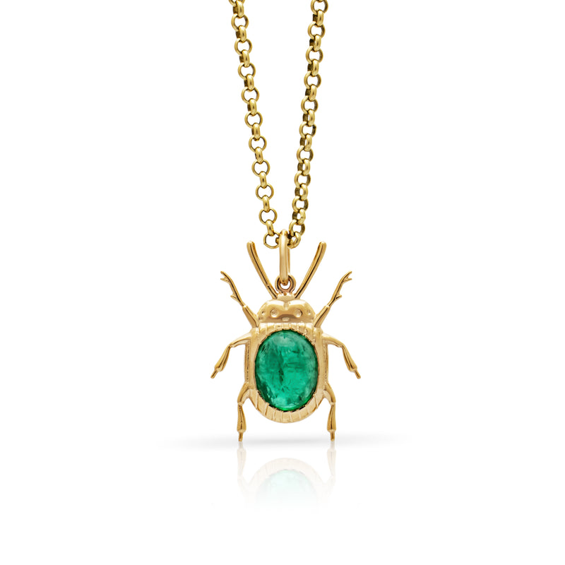 Beetle pendant set with an Emerald cabochon