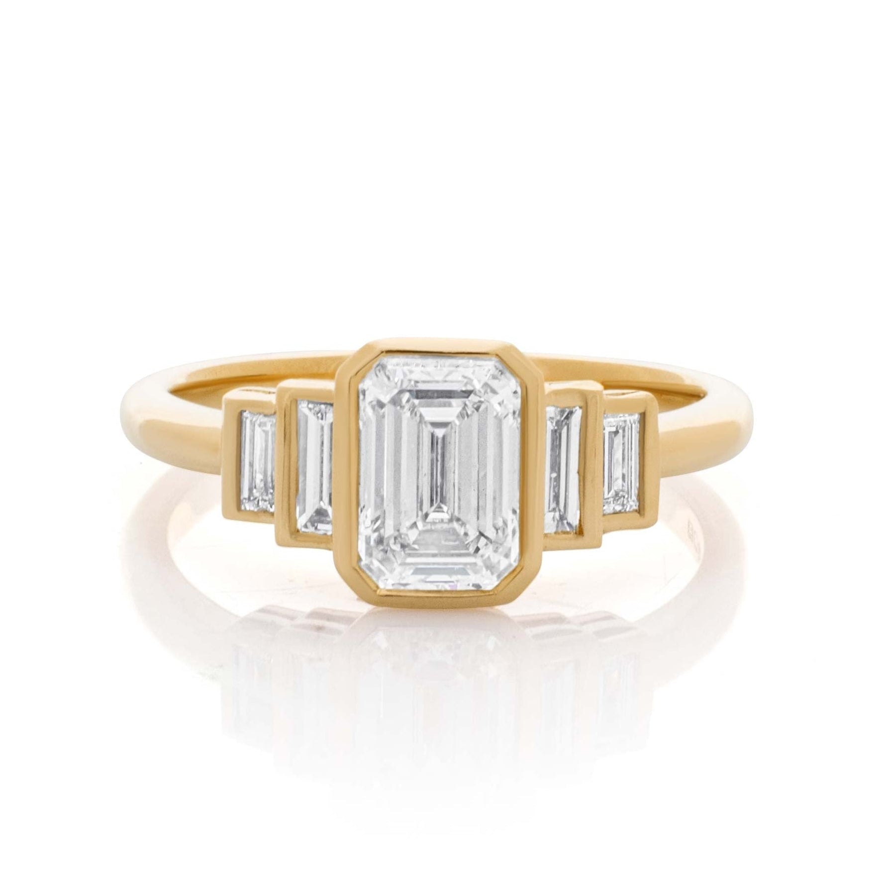 Emerald cut Diamond engagement ring. Five stone engagement ring. Art Deco engagement ring. Bespoke engagement ring. Bespoke engagement ring designer. Bespoke engagement ring London. 