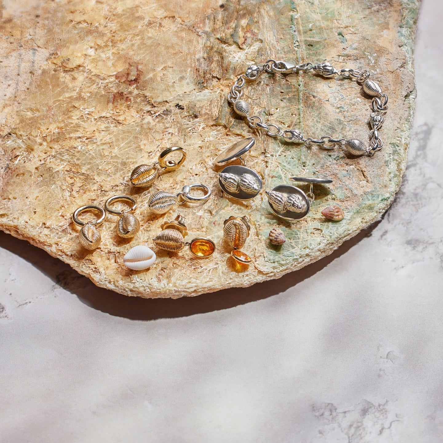 Langland stud earrings. Cowrie shell stud earrings. Mumbles jewellery. Langland Bay, Wales. Wales jewellery. Gower jewellery. Wales shell jewellery. Silver shell jewellery. Gold shell jewellery. Those Happy Places. Serena Ansell Jewellery. Cowrie earrings.