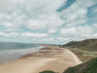 Rhossili pendant. Rhossili charm. Rhossili necklace. Rhossili Bay, Wales. Welsh jewellery. Gower jewellery. Wales shell jewellery. Silver shell jewellery. Gold shell jewellery. Those Happy Places. Serena Ansell Jewellery.  