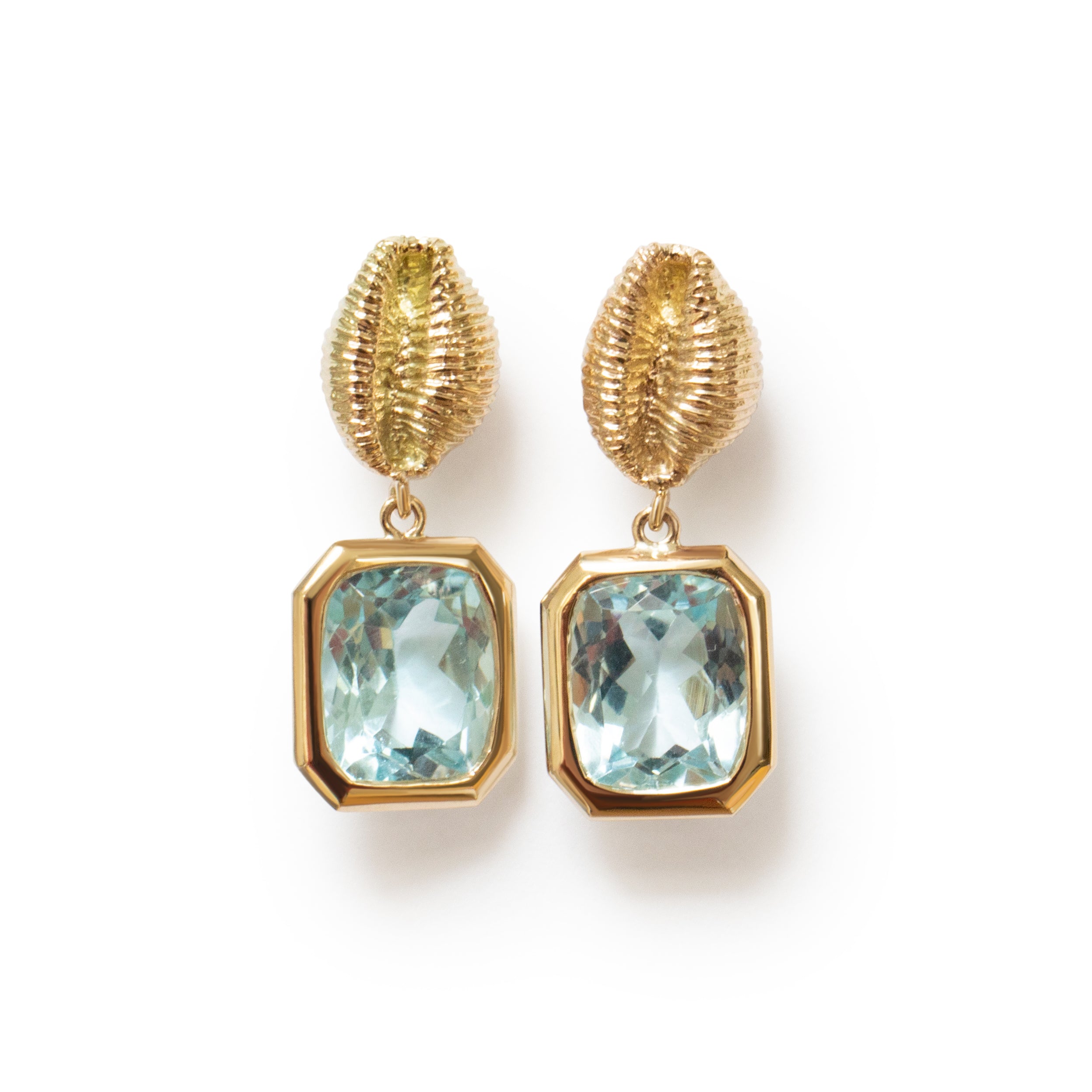 Bespoke 'Those Happy Places' collection Langland Bay Shell Earrings in gold with a cushion cut Topaz Drop. Serena Ansell bespoke jewellery design. Bespoke jewellery designer London. Bespoke earrings London. 