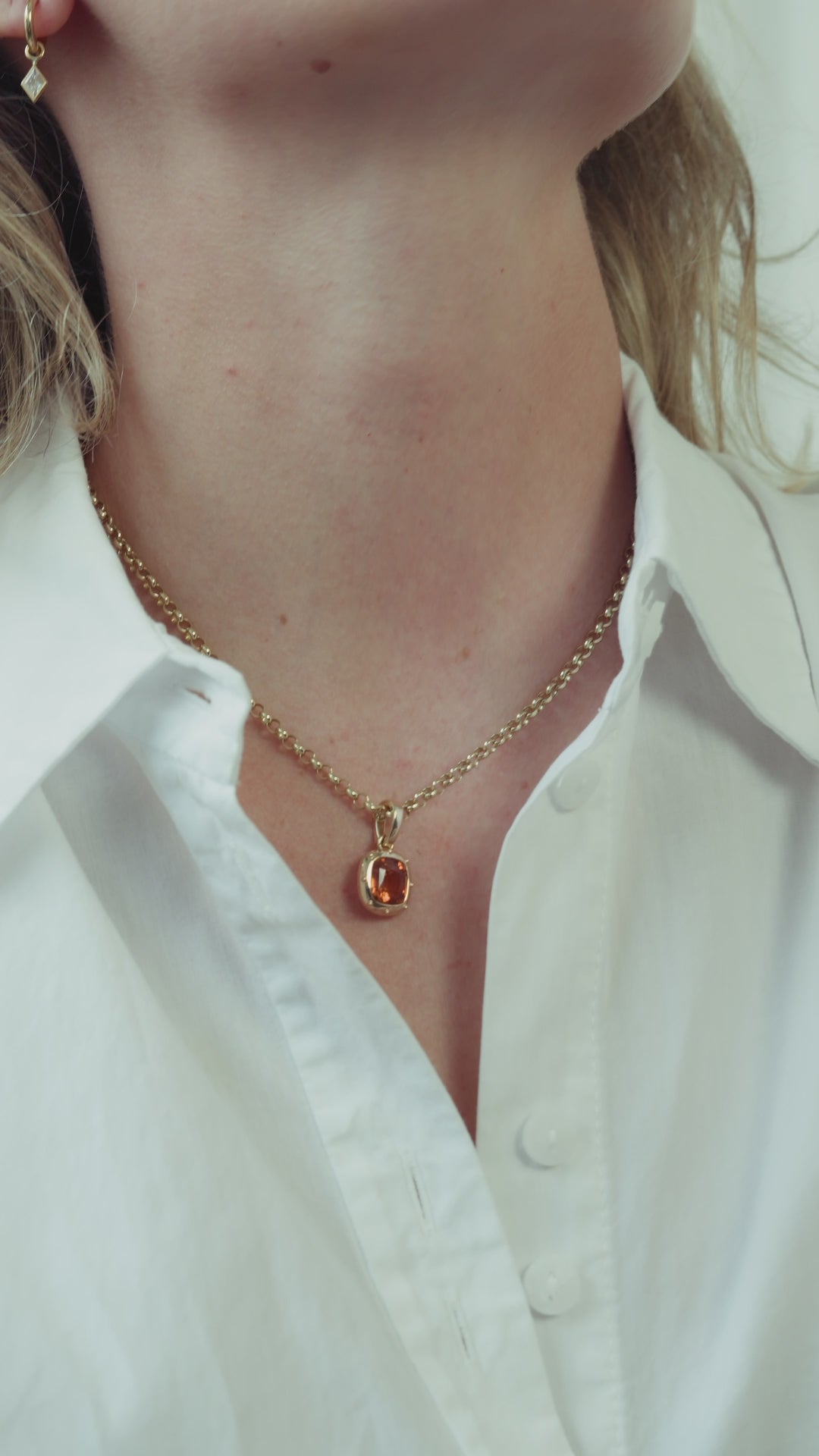 Hessonite garnet pendant. Orange gemstone pendant set in gold