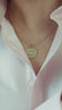 Medallion pendant. Gold medallion. Diamond medallion. Solid gold and diamond pendant. Diamond disc pendant. Gold disc pendant. 